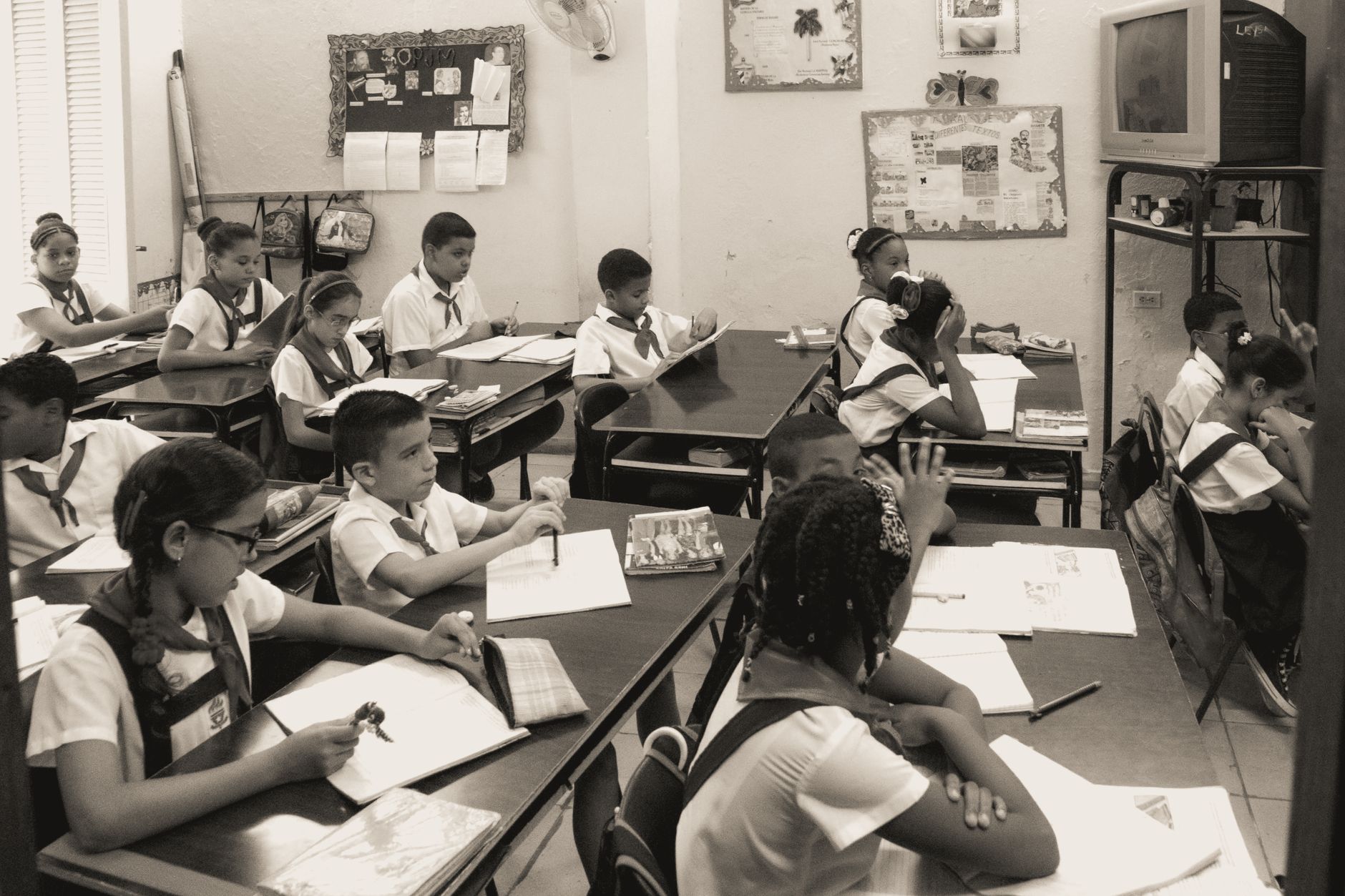 children sitting in a classroom